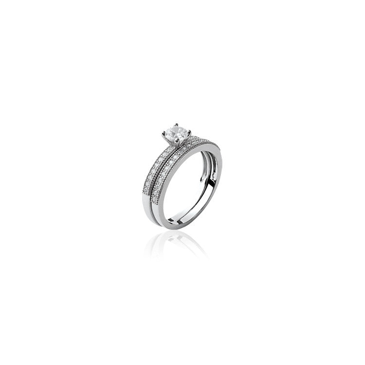 Bague en argent 925/000 et oxyde de zirconium composée d'une alliance et d'un solitaire